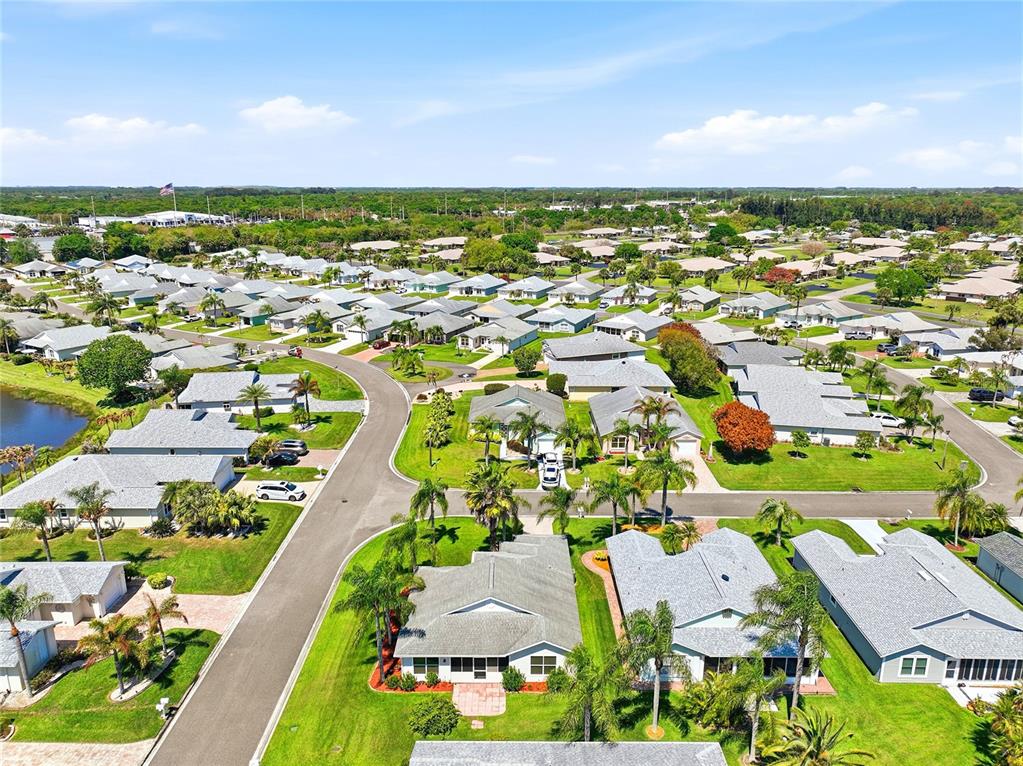 5930 Foxtail Way Fort Pierce, FL 34982 - Photo 38 of 47 an aerial view of residential building and street