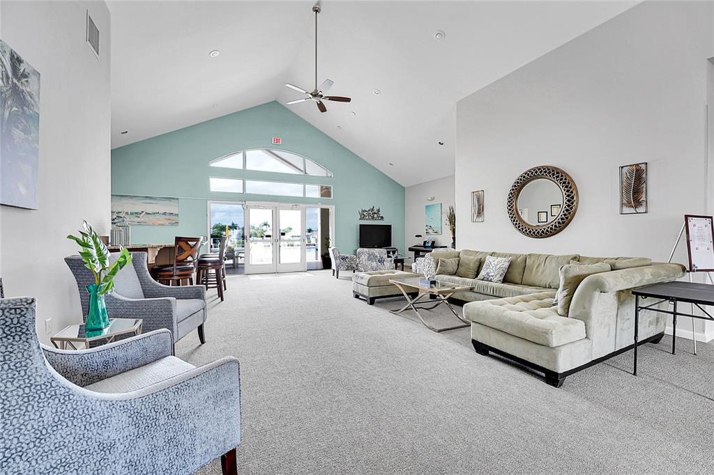 5930 Foxtail Way Fort Pierce, FL 34982 - Photo 42 of 47 a living room with furniture and a large window
