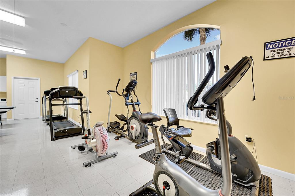 5930 Foxtail Way Fort Pierce, FL 34982 - Photo 43 of 47 a view of a room with gym equipment