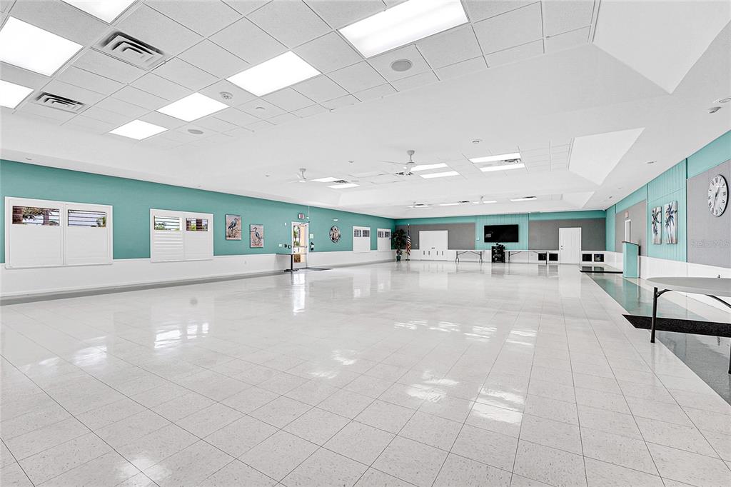 5930 Foxtail Way Fort Pierce, FL 34982 - Photo 45 of 47 a living room with lots of furniture and a large window