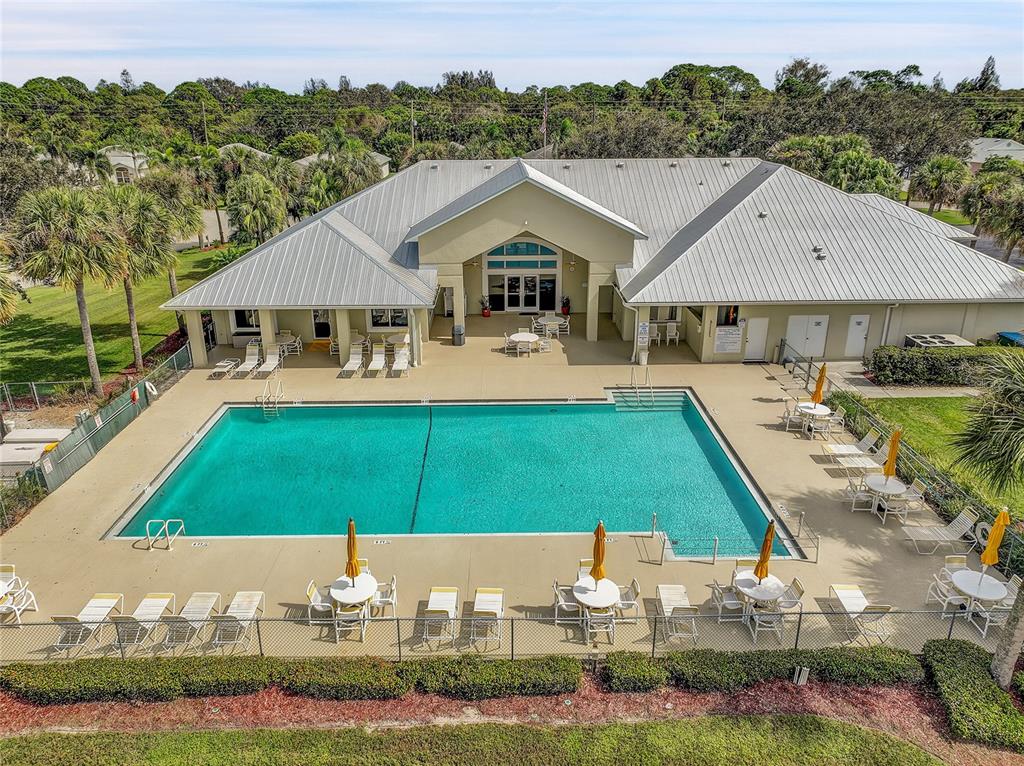 5930 Foxtail Way Fort Pierce, FL 34982 - Photo 46 of 47 a front view of house with yard and green space