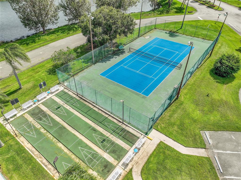 5930 Foxtail Way Fort Pierce, FL 34982 - Photo 47 of 47 a view of a tennis ground with a small pool