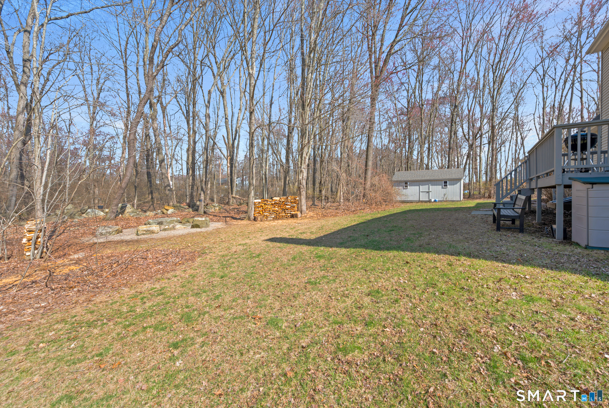 16 Gardner Tavern Road Coventry, CT 06238 - Photo 30 of 40 Stone firepit and shed in back yard.