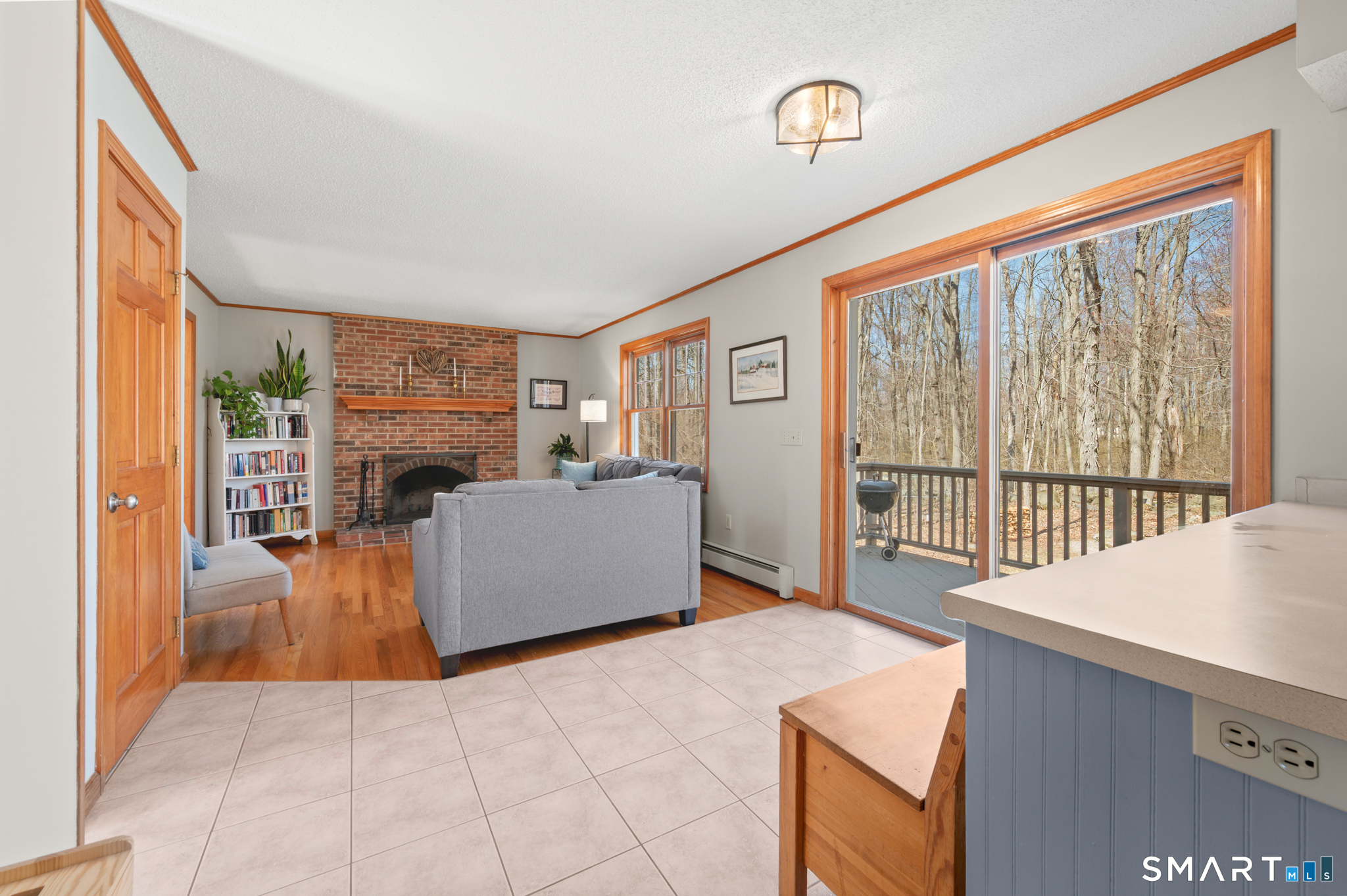 16 Gardner Tavern Road Coventry, CT 06238 - Photo 39 of 40 The open floor plan allows you to enjoy the fireplace from the living room, dining area and kitchen!