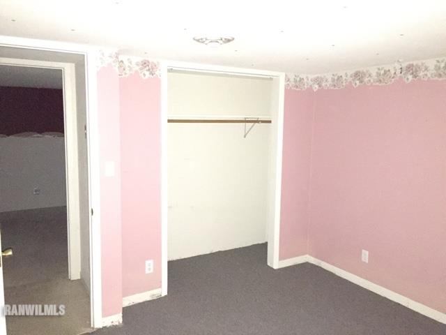 12995 Center Road Durand, IL 61024 - Photo 14 of 14 a view of a room with a refrigerator and a table