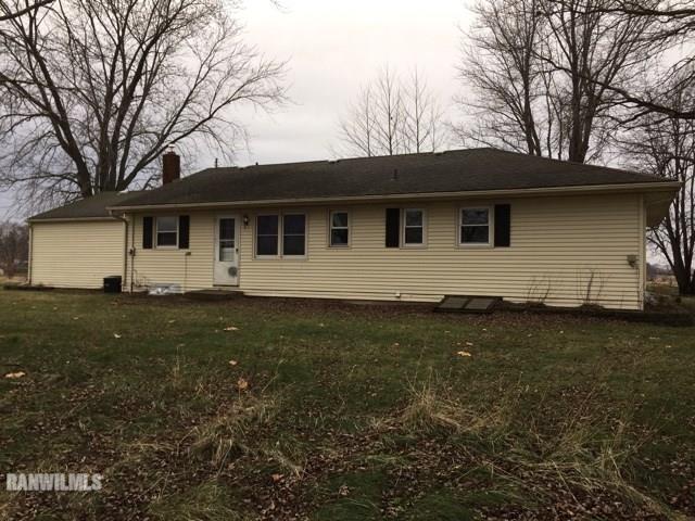 12995 Center Road Durand, IL 61024 - Photo 2 of 14 a front view of house with yard and trees