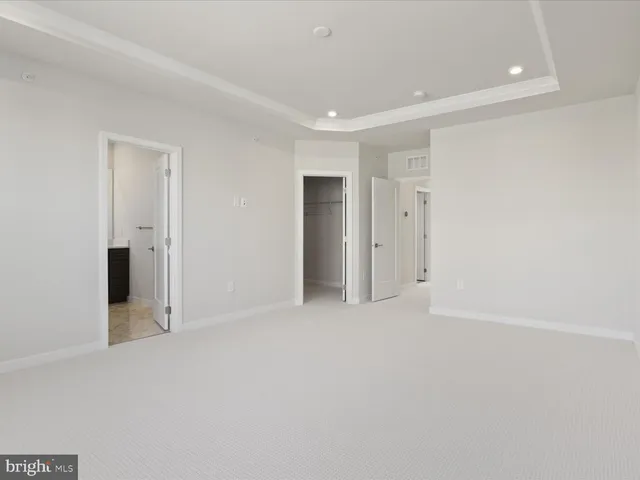 a bathroom with a sink vanity and a mirror