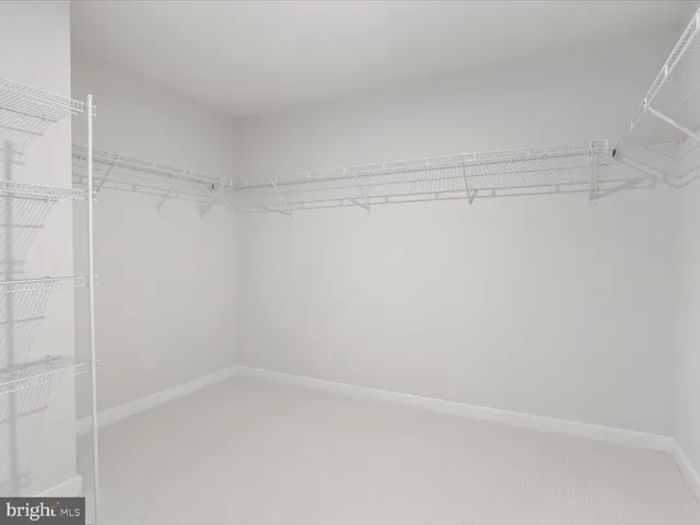 a bathroom with a sink a washer and dryer