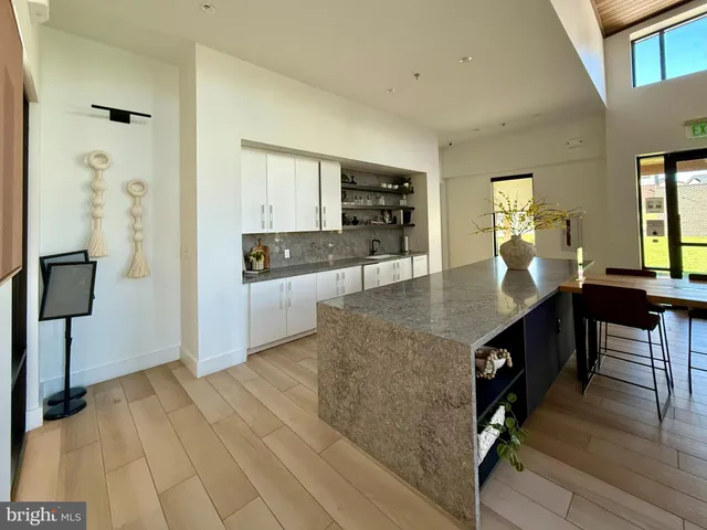 a view of a big yard with an outdoor seating