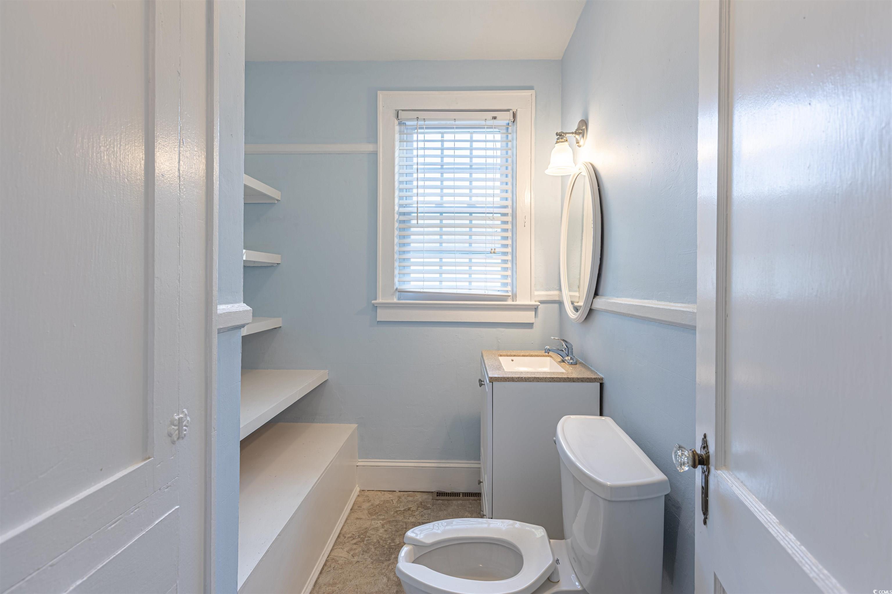 505 North Longstreet Street Kingstree, SC 29556 - Photo 19 of 34 Bathroom featuring vanity and light tile patterned floors
