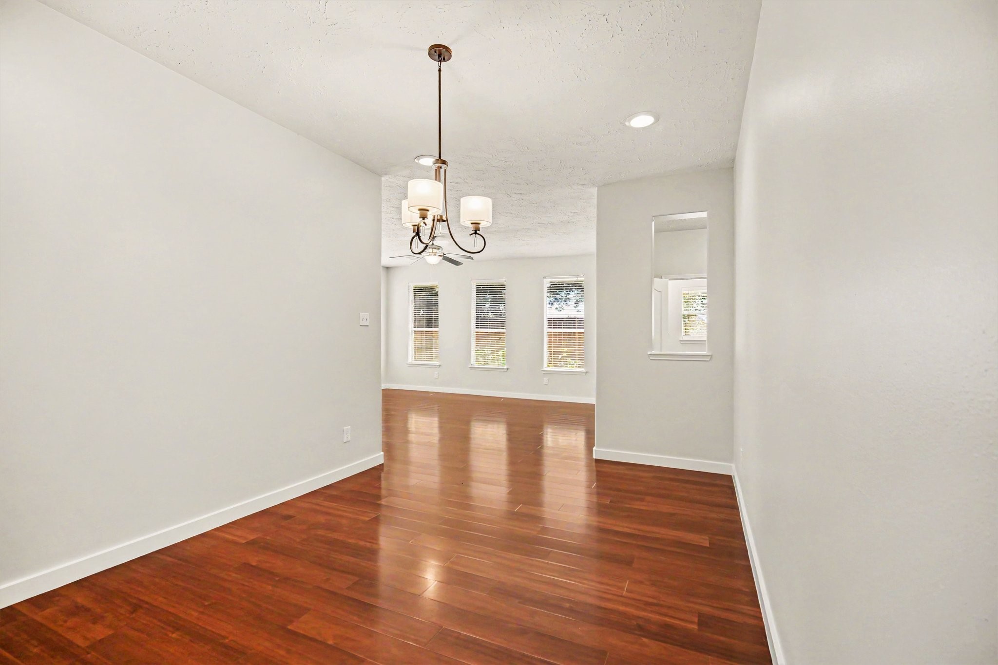 7419 Hollister Ridge Houston, TX 77040 - Photo 6 of 27 Spacious formal dining room with new lighting.