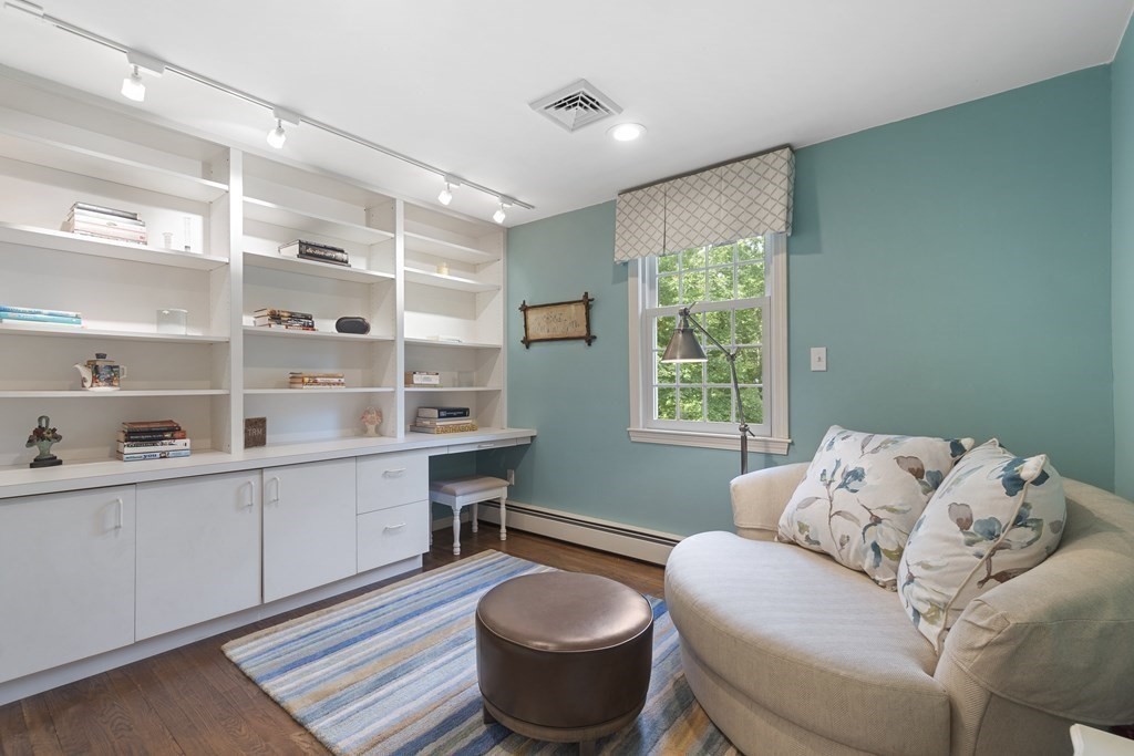 57 Surrey Lane Boxford, MA 01921 - Photo 23 of 42 a living room with furniture and a wooden floor