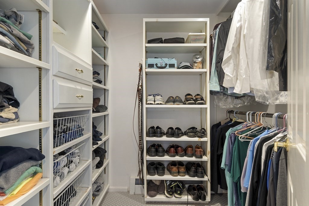 57 Surrey Lane Boxford, MA 01921 - Photo 29 of 42 a view of walk in closet with clothes and shoes