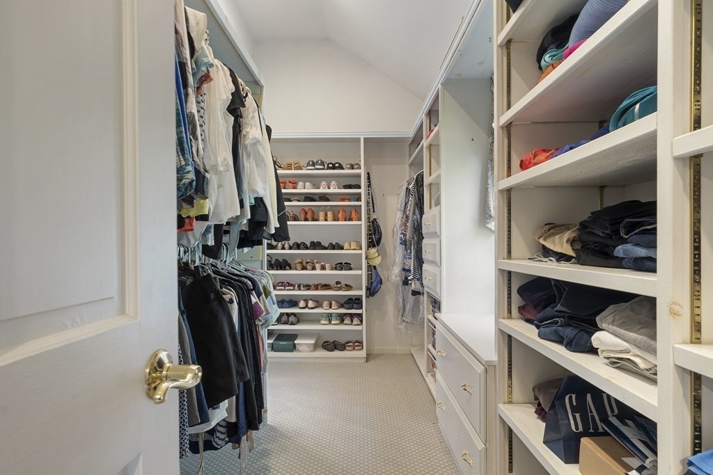 57 Surrey Lane Boxford, MA 01921 - Photo 31 of 42 a view of walk in closet with clothes and shoes