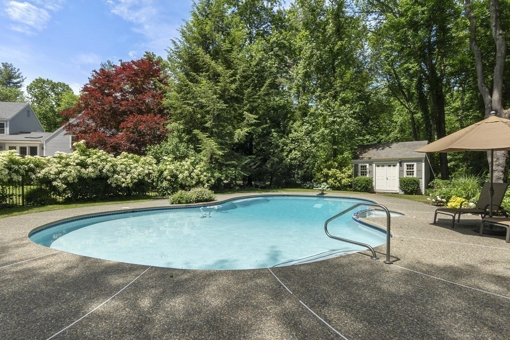 57 Surrey Lane Boxford, MA 01921 - Photo 36 of 42 a view of swimming pool with seating space