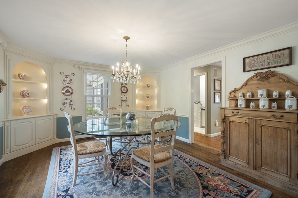 57 Surrey Lane Boxford, MA 01921 - Photo 7 of 42 a view of a dining room with furniture and chandelier