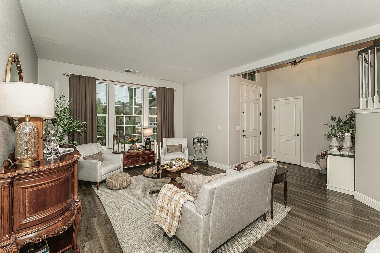 1175 Applegate Avenue Clovis, CA 93611 - Photo 19 of 65 a living room with furniture and large windows