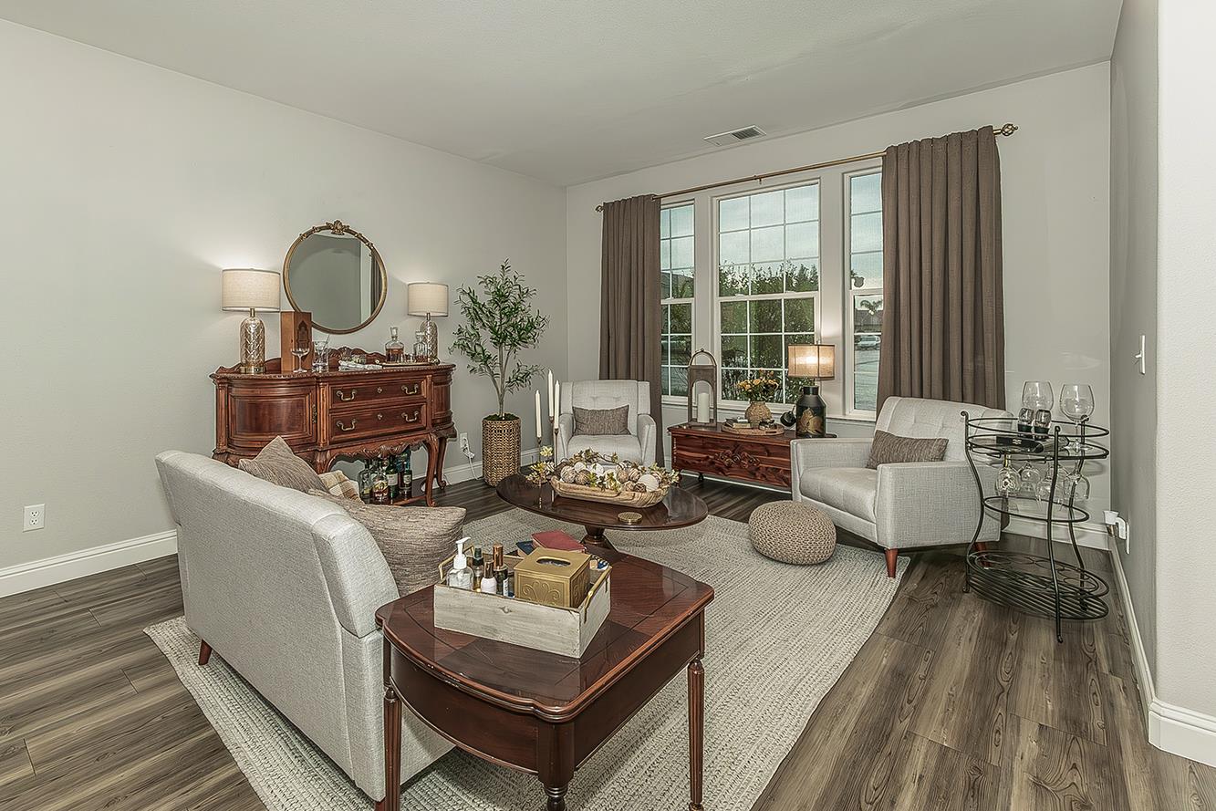 1175 Applegate Avenue Clovis, CA 93611 - Photo 20 of 65 a living room with furniture and wooden floor