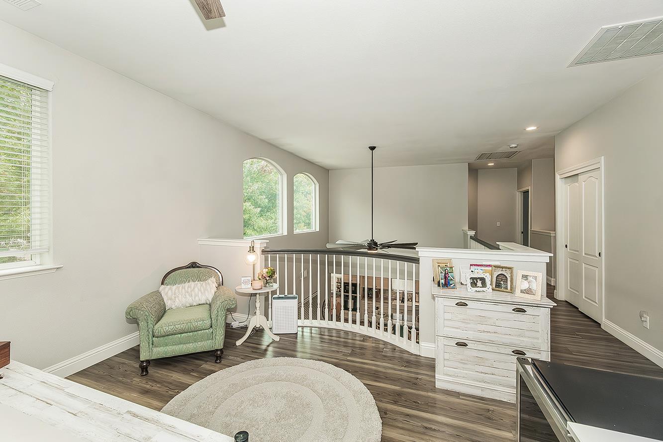 1175 Applegate Avenue Clovis, CA 93611 - Photo 33 of 65 a bedroom with furniture and a window