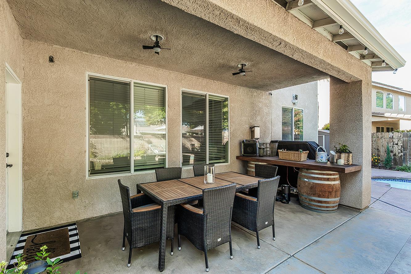 1175 Applegate Avenue Clovis, CA 93611 - Photo 40 of 65 a view of a dining room with furniture window and outside view