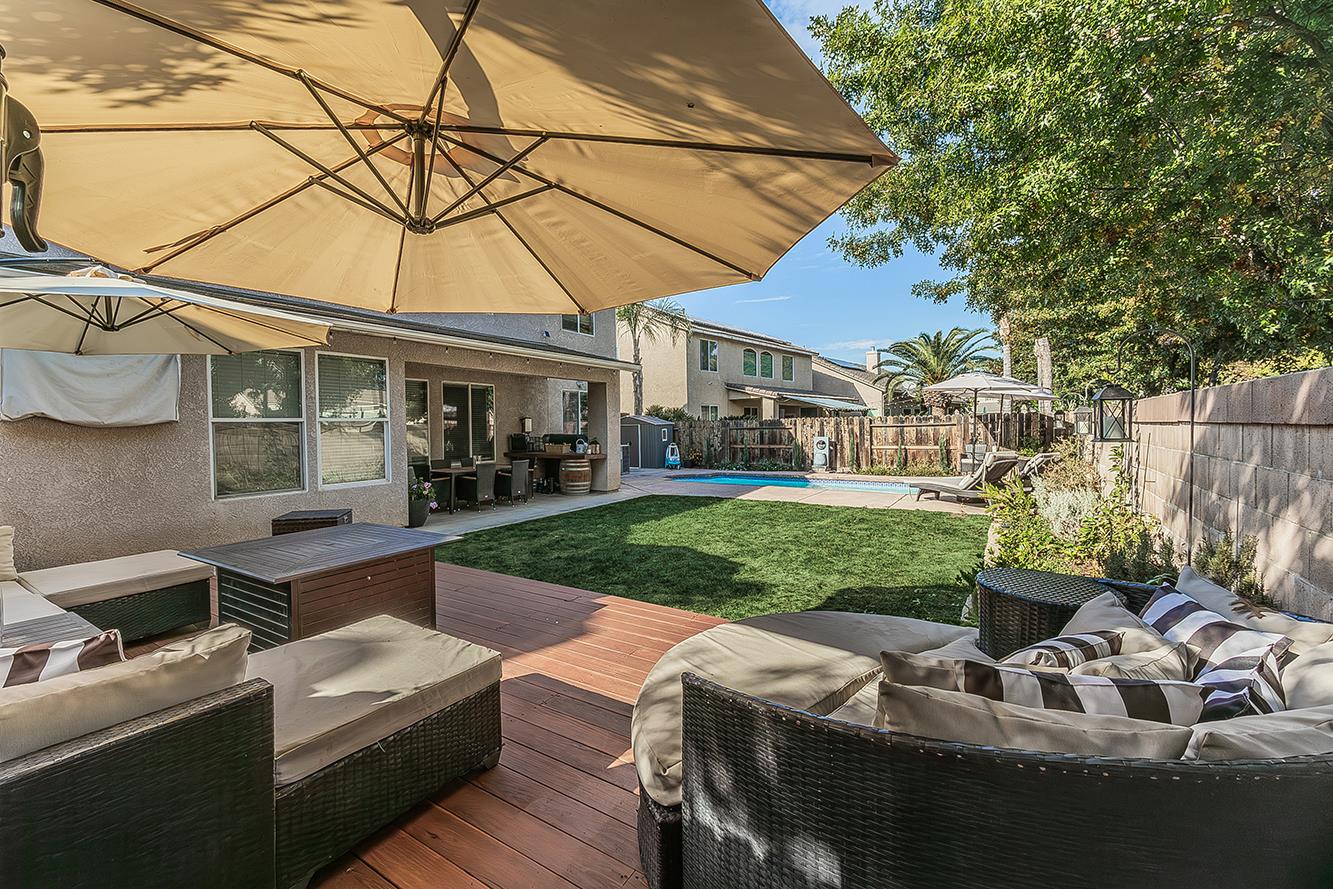 1175 Applegate Avenue Clovis, CA 93611 - Photo 46 of 65 a view of backyard with outdoor seating and green space