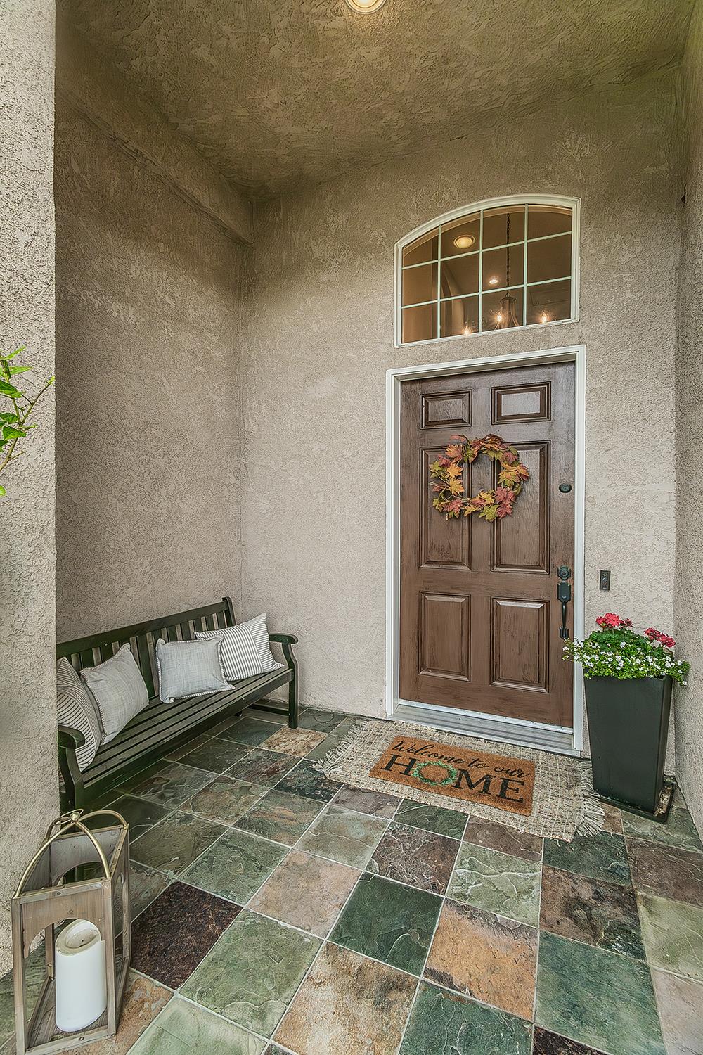 1175 Applegate Avenue Clovis, CA 93611 - Photo 58 of 65 a front view of a house with entryway