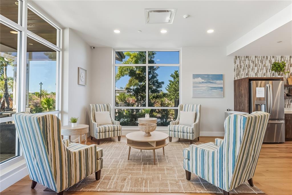 17932 Gander Terrace Lakewood Ranch, FL 34211 - Photo 51 of 52 a living room with furniture and a large window