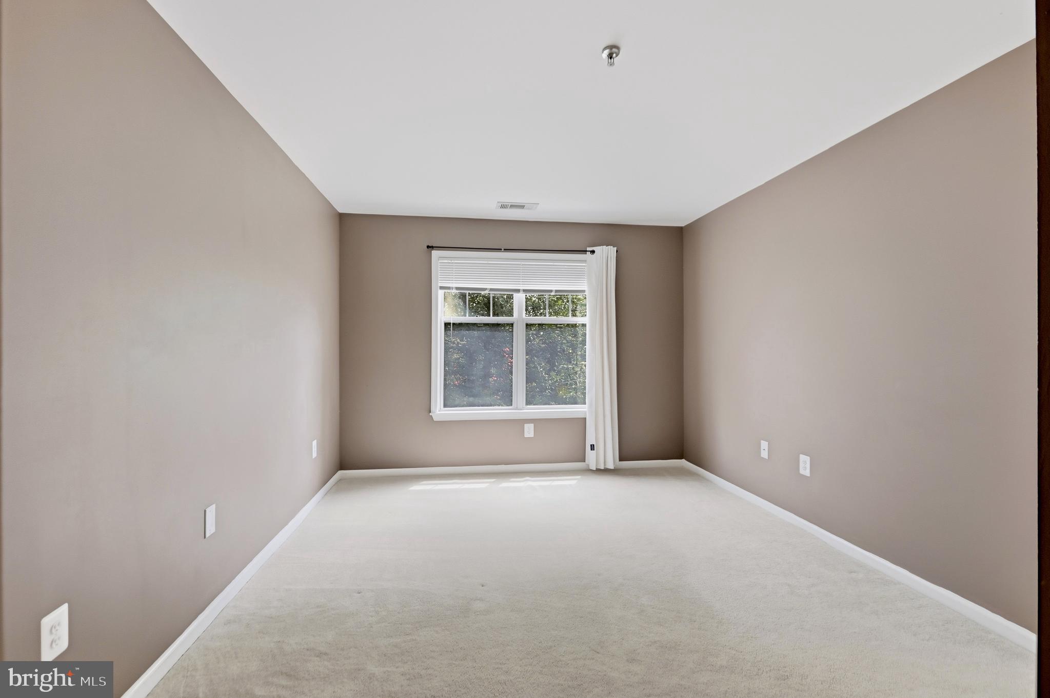 5565 Seminary Road, Unit 314 Falls Church, VA 22041 - Photo 12 of 22 a view of an empty room with a window