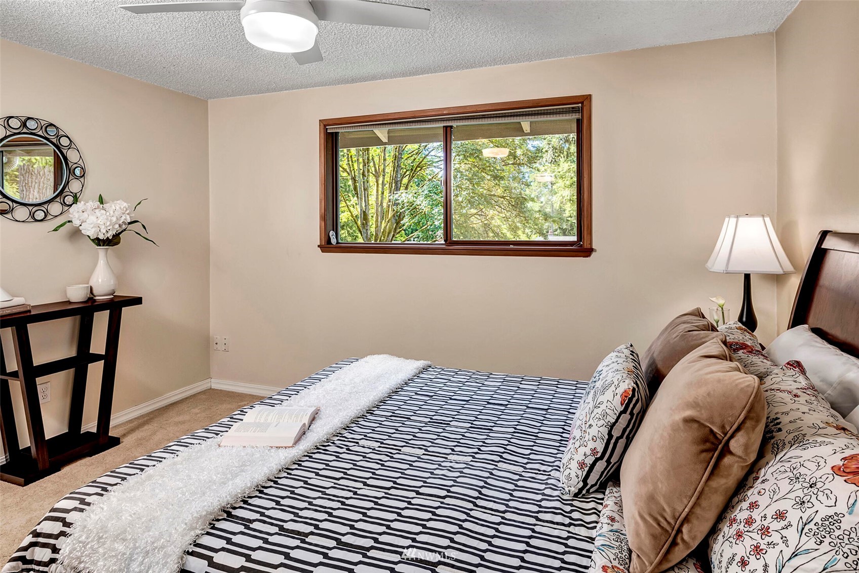 2322 243rd Place Southwest Bothell, WA 98021 - Photo 13 of 29 a bedroom with a bed and a window