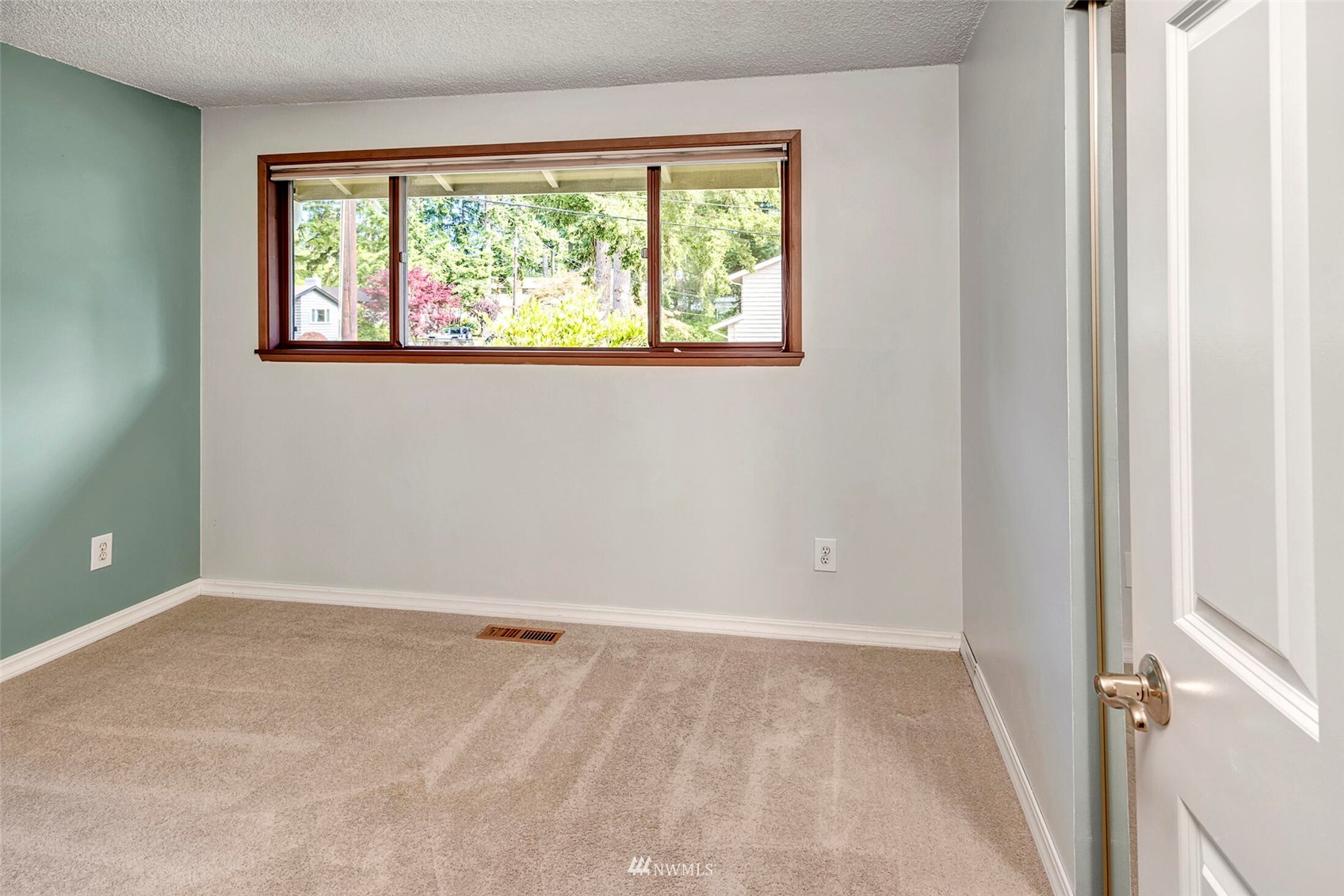 2322 243rd Place Southwest Bothell, WA 98021 - Photo 14 of 29 a view of an empty room with a window