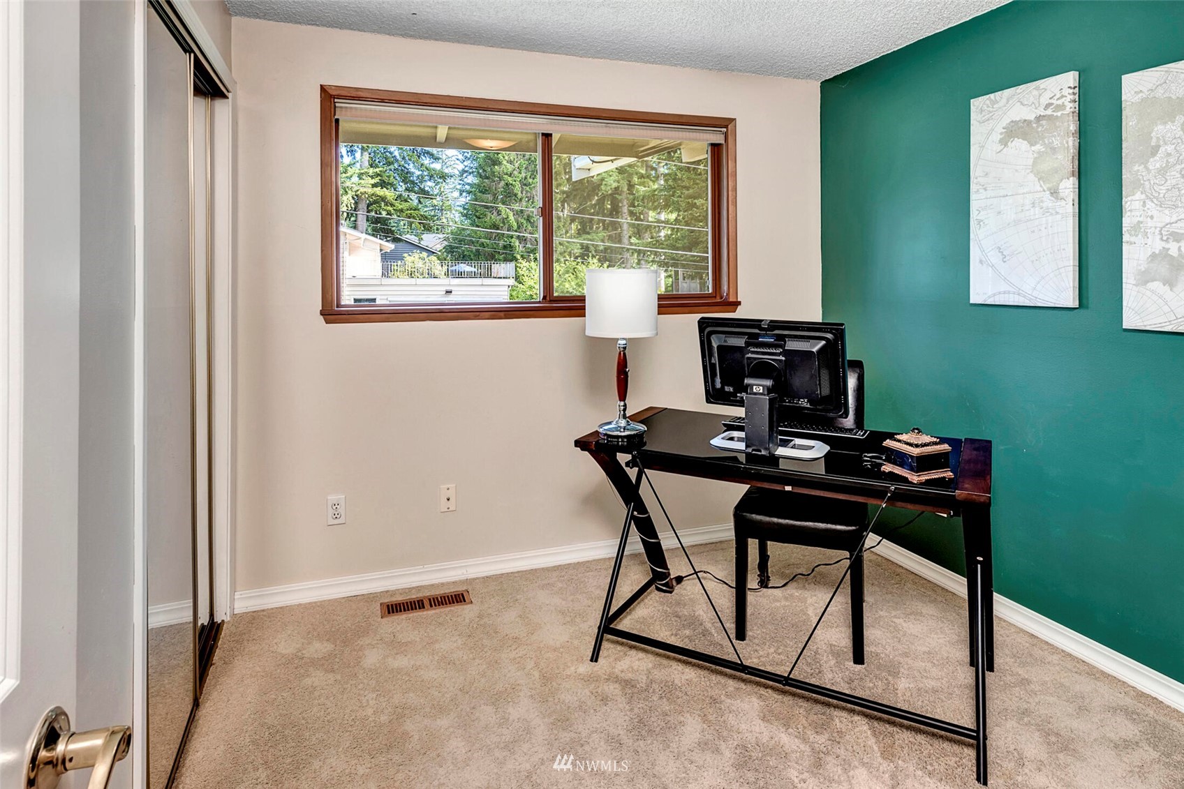 2322 243rd Place Southwest Bothell, WA 98021 - Photo 15 of 29 a view of a workspace with furniture and a window