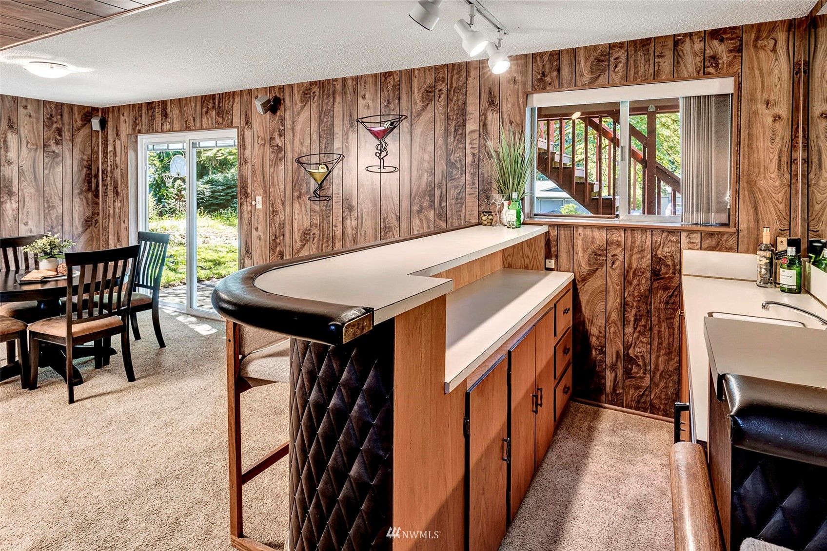 2322 243rd Place Southwest Bothell, WA 98021 - Photo 20 of 29 a view of a kitchen with furniture and large windows
