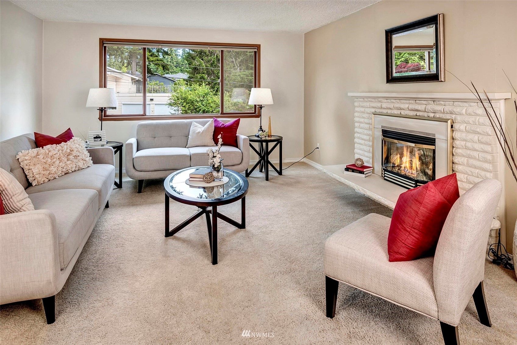 2322 243rd Place Southwest Bothell, WA 98021 - Photo 2 of 29 a living room with furniture and a fireplace