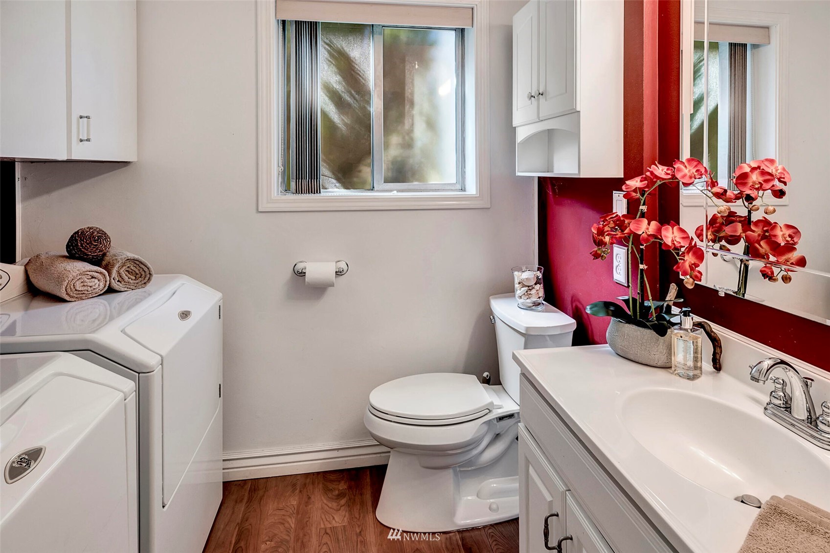 2322 243rd Place Southwest Bothell, WA 98021 - Photo 21 of 29 a bathroom with a sink toilet and a mirror