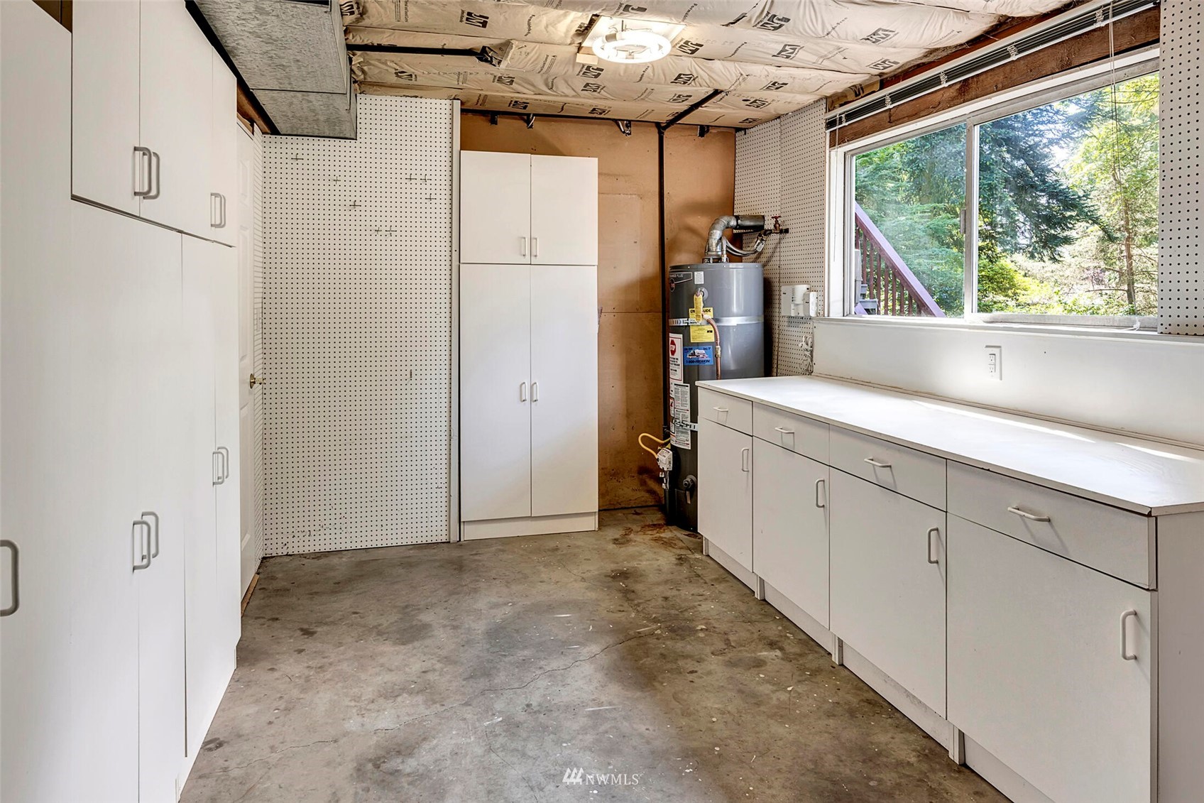 2322 243rd Place Southwest Bothell, WA 98021 - Photo 23 of 29 a view of a storage & utility room with a sink