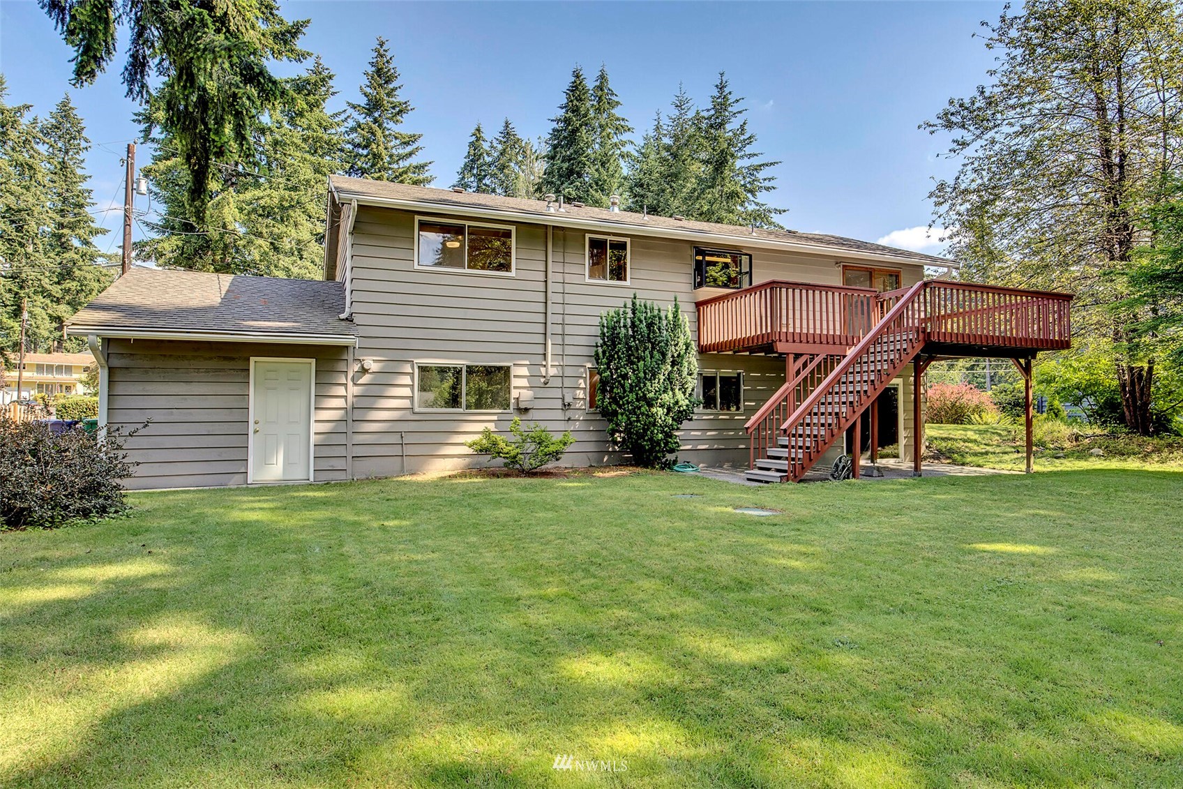 2322 243rd Place Southwest Bothell, WA 98021 - Photo 25 of 29 a view of a house with a backyard