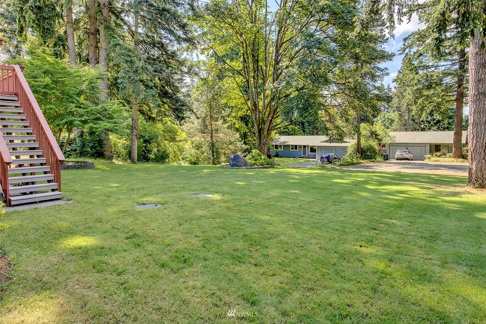 2322 243rd Place Southwest Bothell, WA 98021 - Photo 27 of 29 a view of a house with a big yard