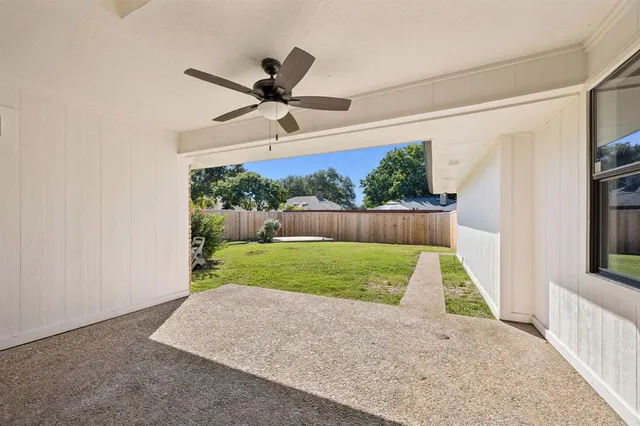 a view of a yard in front of a house