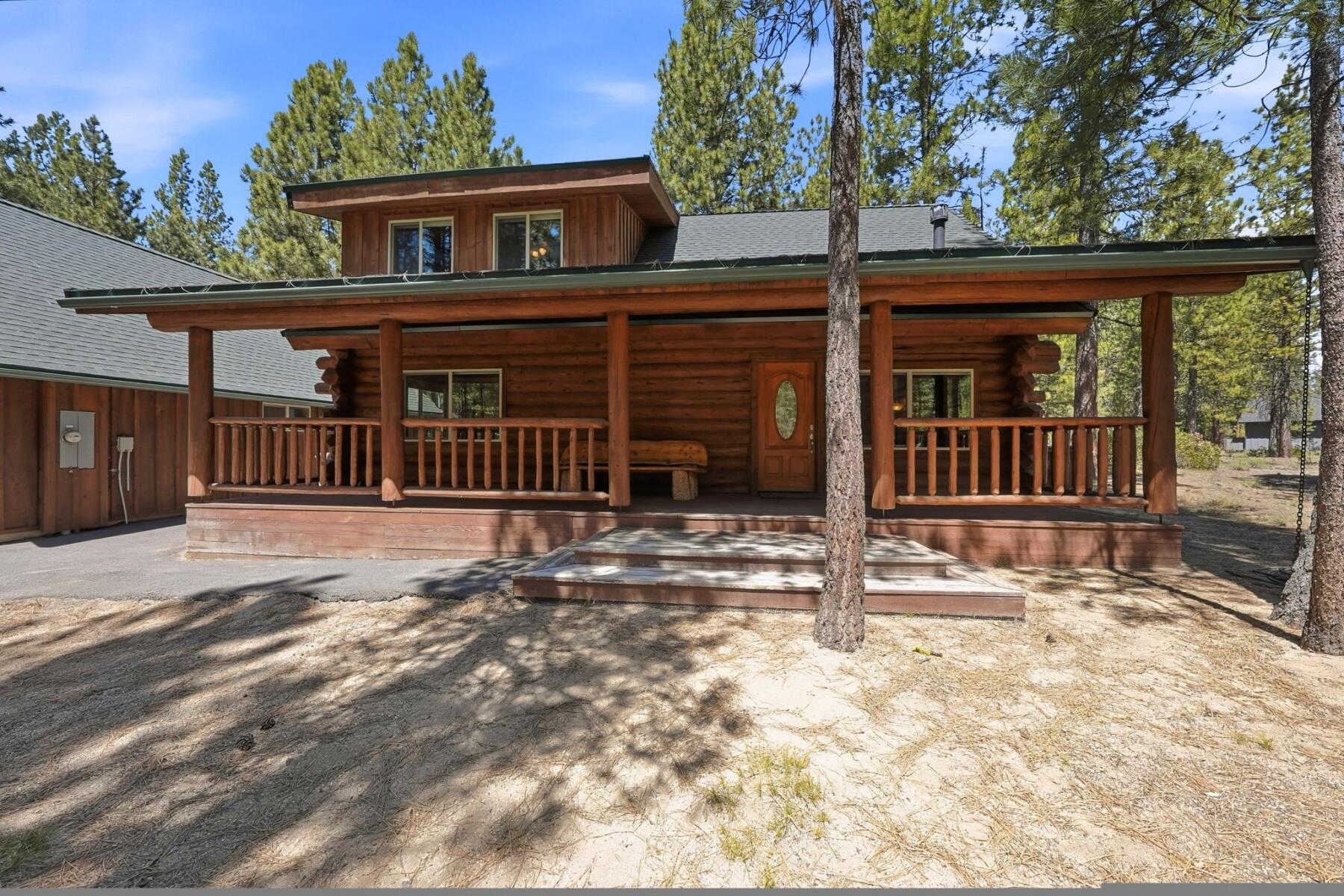 14177 Whitewater Loop La Pine, OR 97739 - Photo 2 of 38 a front view of a house with a porch