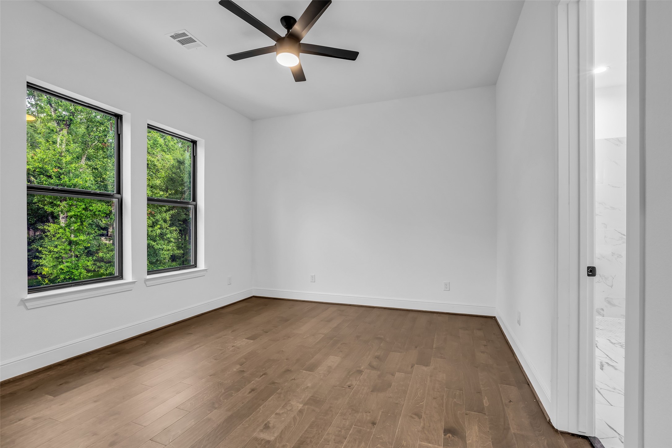 2 Deer Ridge Estates Boulevard Houston, TX 77339 - Photo 17 of 25 All of the secondary bedrooms are spacious and feature a private en suite bathroom.