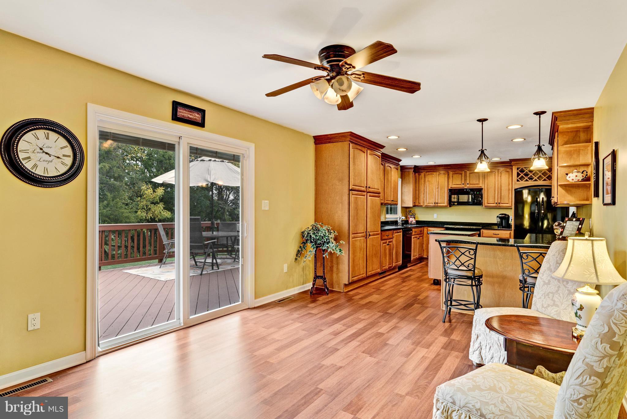 7219 Forrest Road Warrenton, VA 20187 - Photo 13 of 30 Family Room w/sliding glass door to rear deck