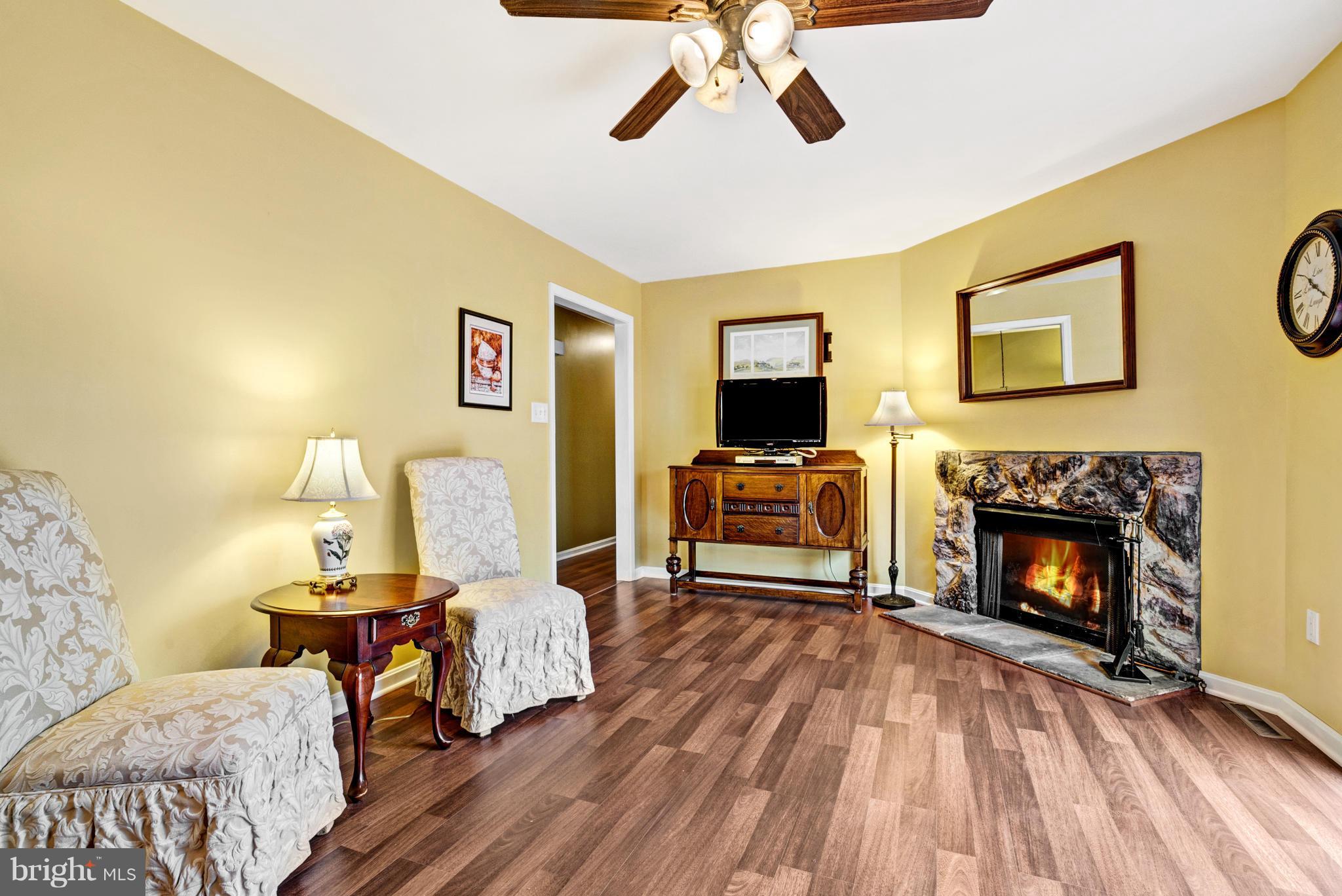 7219 Forrest Road Warrenton, VA 20187 - Photo 14 of 30 Cozy gas-log fireplace in Family Room