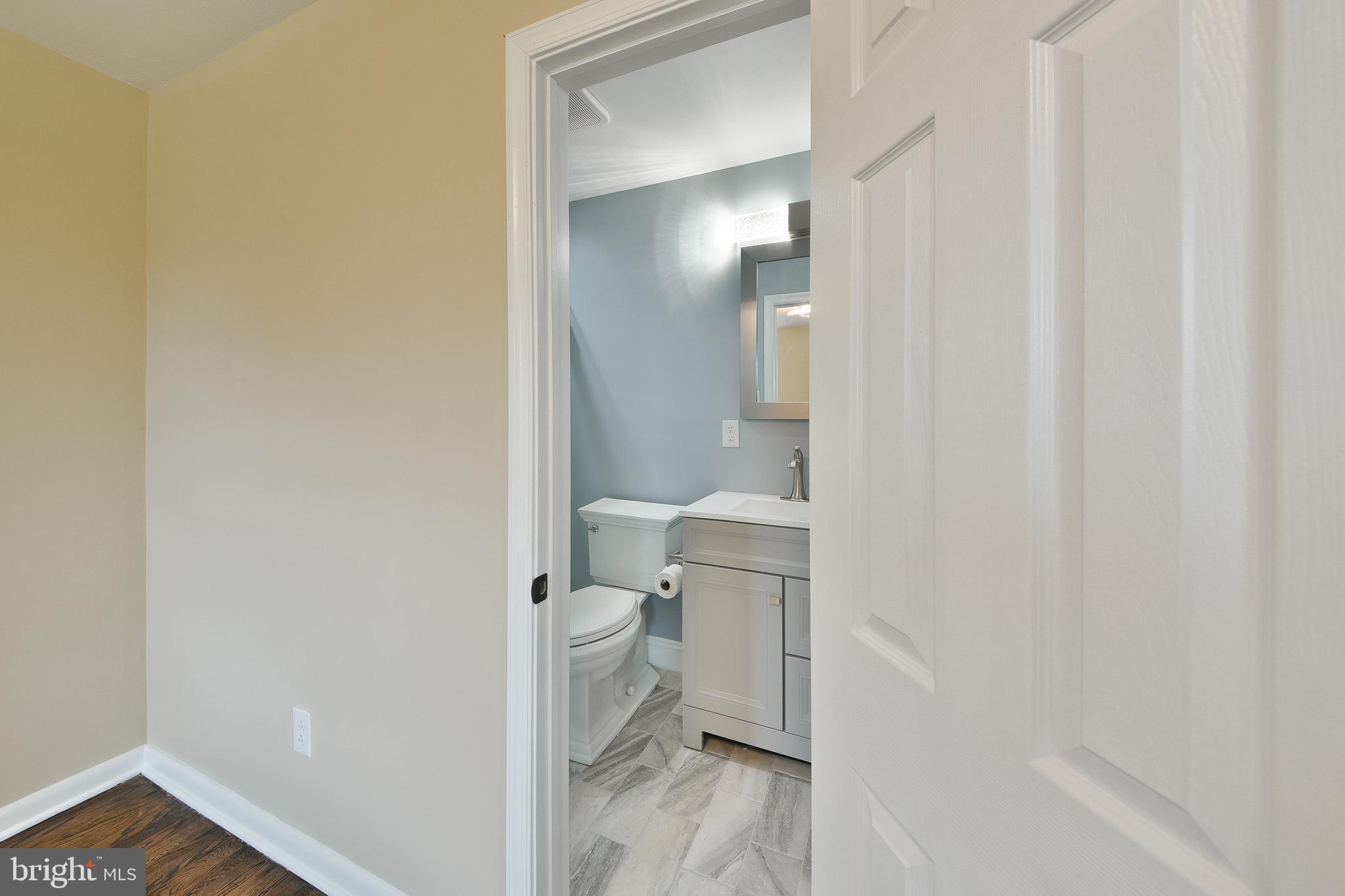 6166 Mechanicsville Road Doylestown, PA 18902 - Photo 13 of 29 a bathroom with a toilet and a shower