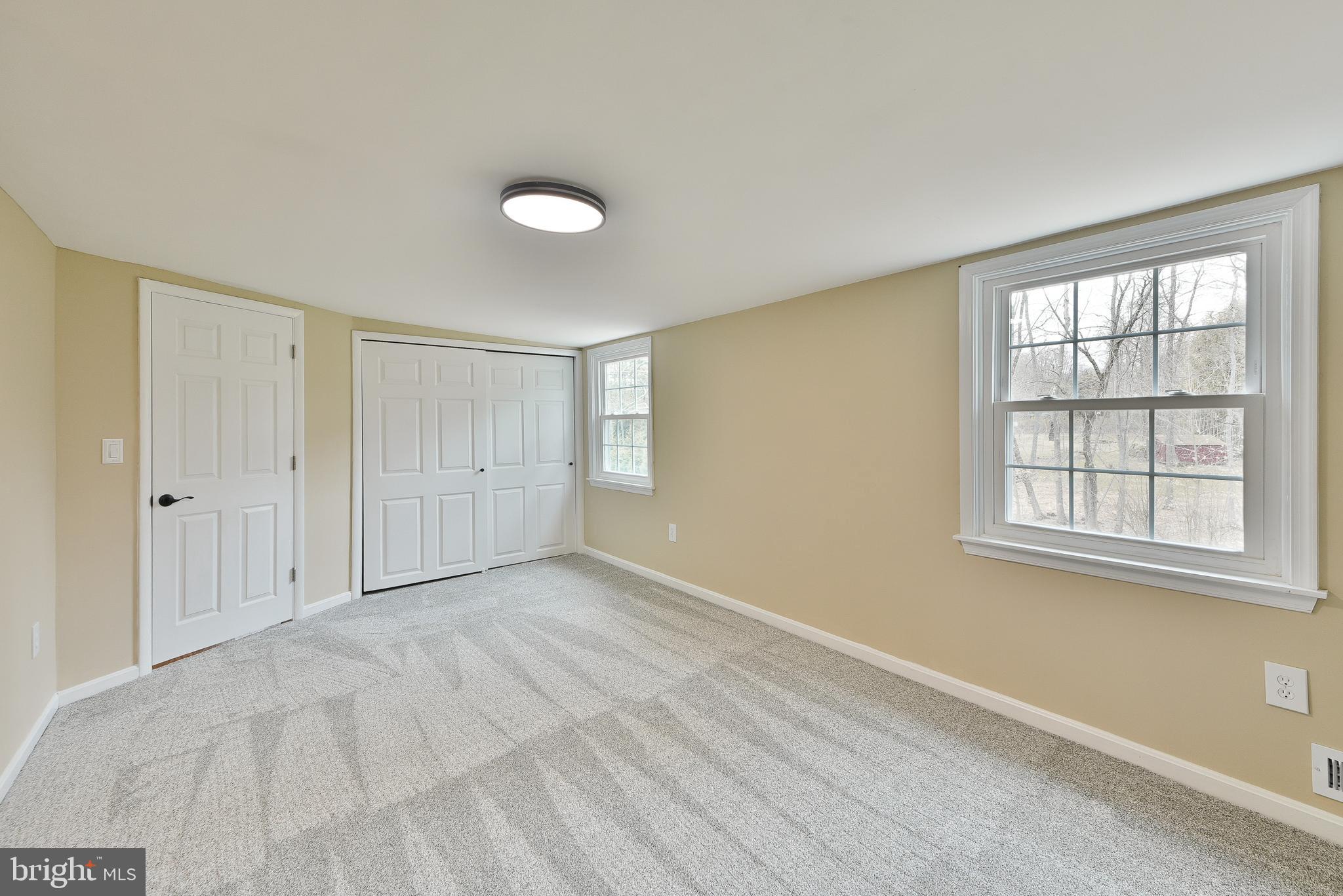 6166 Mechanicsville Road Doylestown, PA 18902 - Photo 15 of 29 a view of an empty room with a window