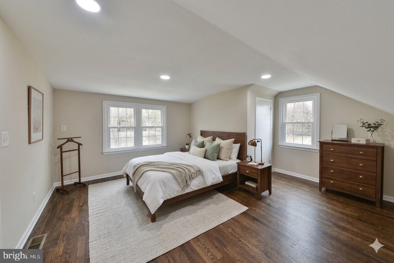 6166 Mechanicsville Road Doylestown, PA 18902 - Photo 18 of 29 a spacious bedroom with a bed and wooden floor