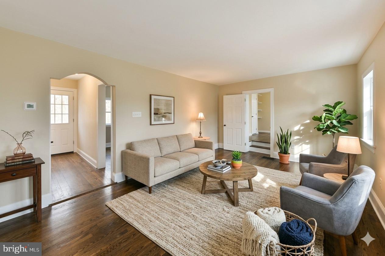 6166 Mechanicsville Road Doylestown, PA 18902 - Photo 6 of 29 a living room with furniture and wooden floor
