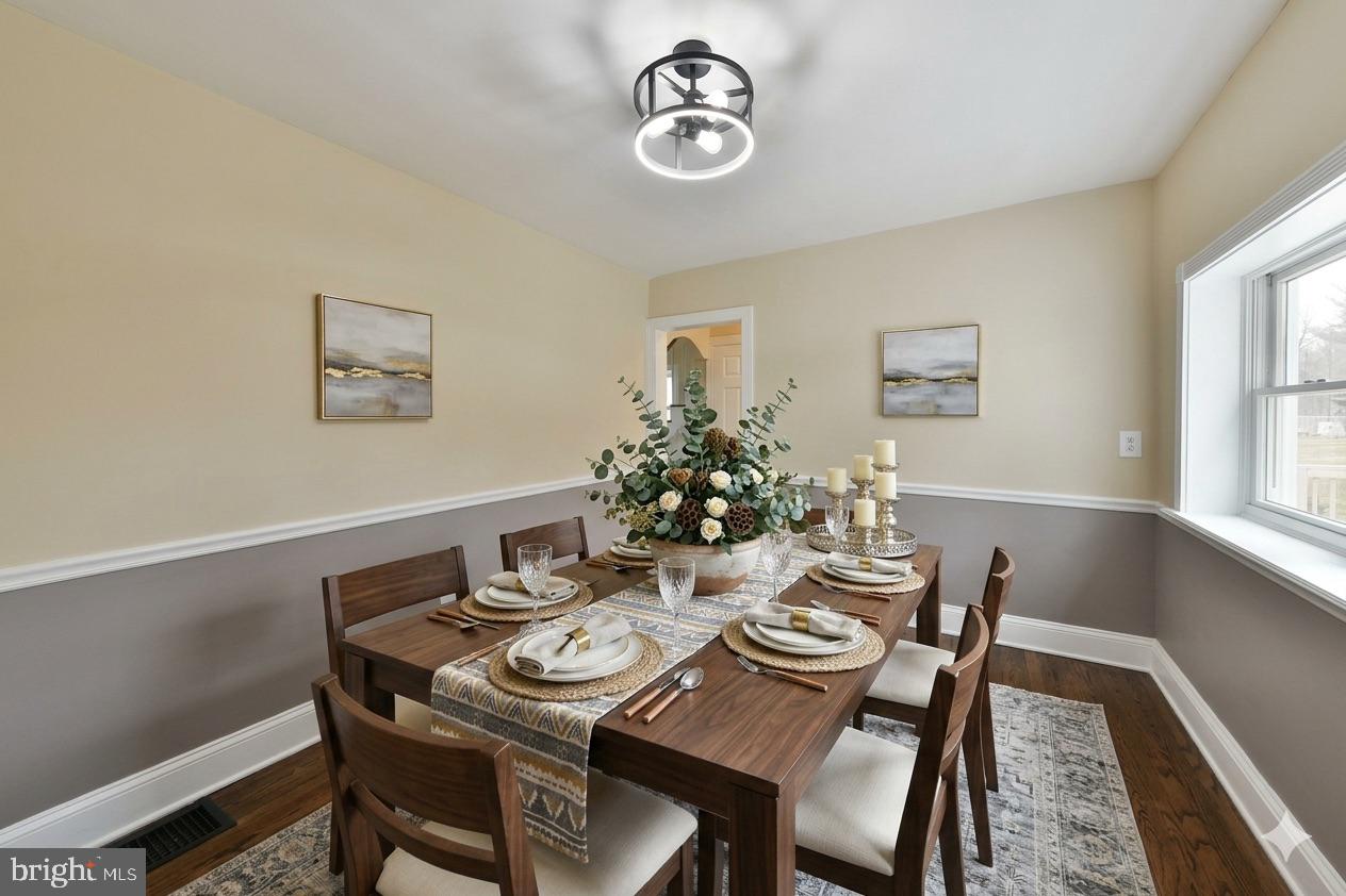 6166 Mechanicsville Road Doylestown, PA 18902 - Photo 8 of 29 a view of a dining room that has a table and chairs