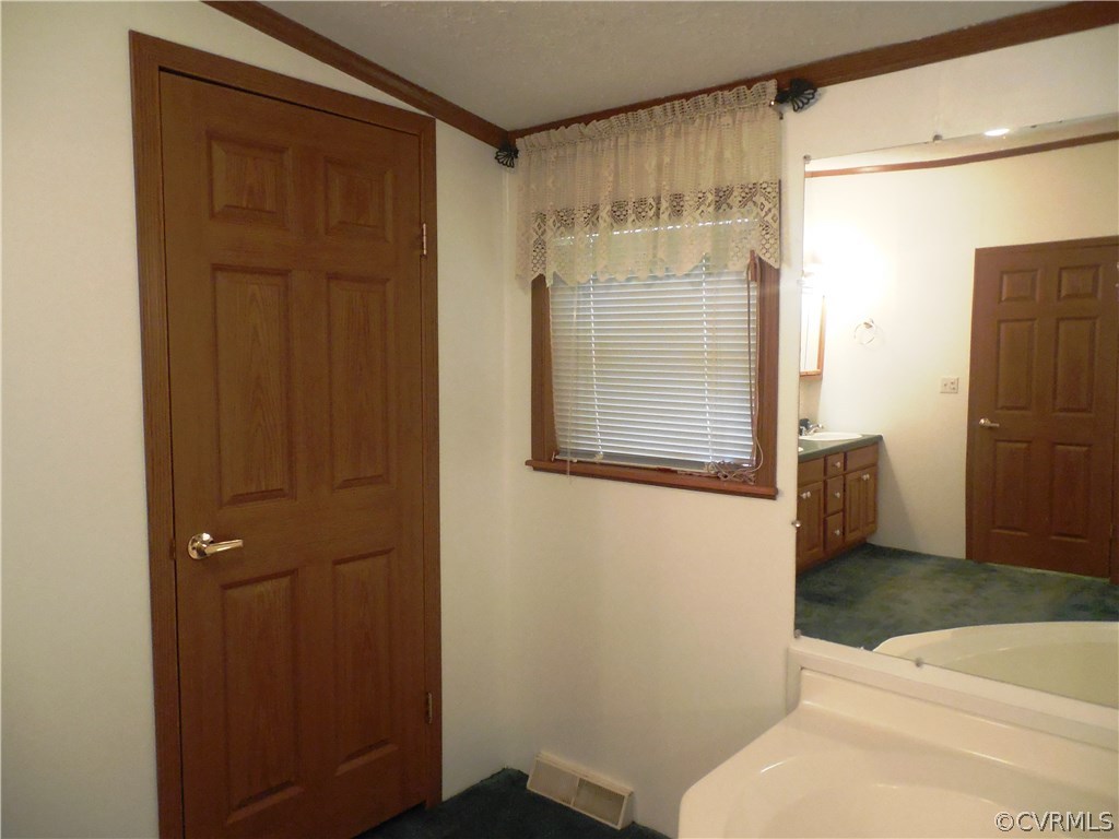 10322 Colemans Lake Road Ford, VA 23850 - Photo 44 of 49 a bathroom with a shower and a toilet