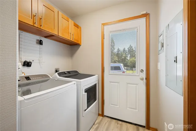 a glass door with glass windows and garden