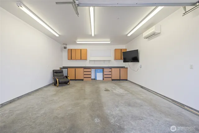 a front view of house with yard and outdoor seating
